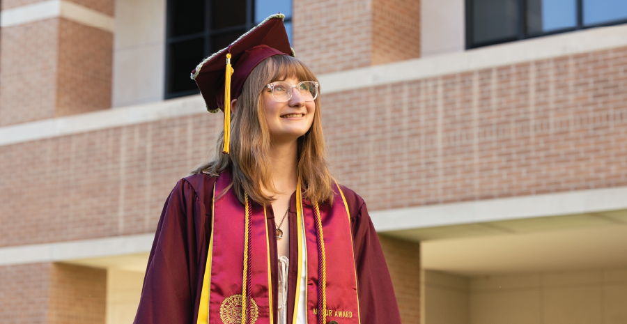 Woman in graduation regalia