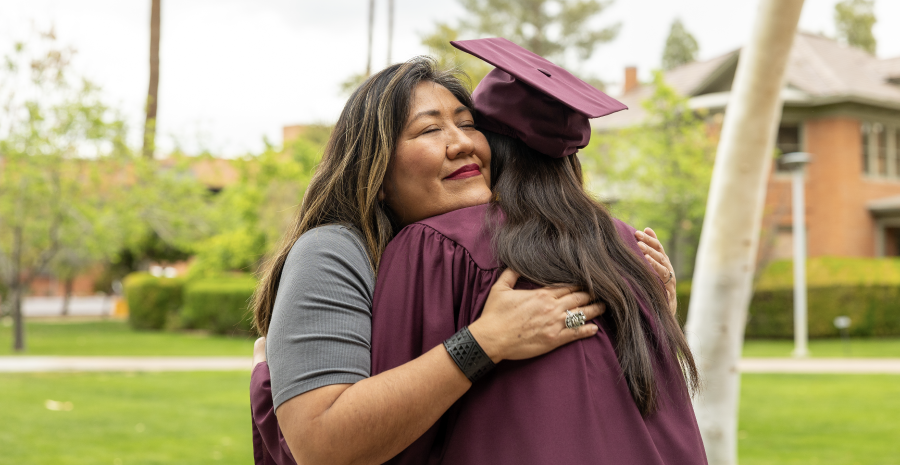 Mom hugging student
